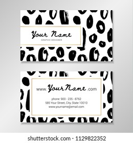 Vector business card template with hand painted brush smears and golden frame.