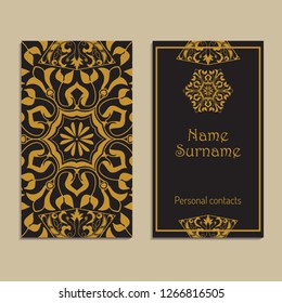 Vector business card template. Moroccan, Arabic, asian ornaments in golden color. Geometric and floral motifs