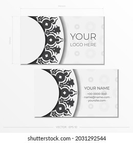 Vector business cards with vintage patterns.Printable white business card design with greek luxury patterns.