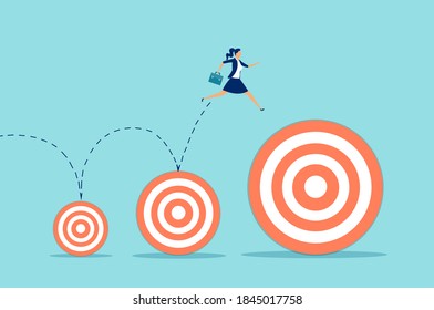 Vector of a business woman jumping up a higher target career goals