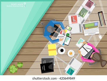 Vector Businessman brainstorming ideas for a mobile phone, tablet, laptop, diary, files, pencils, paper and a cup of coffee flat design