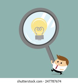 Vector of Businessman using magnifying glass to find the idea
