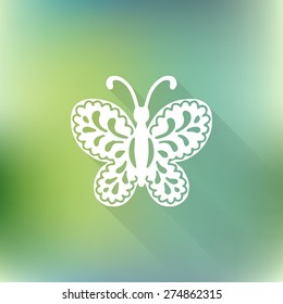 Vector butterfly icon with long shadow on green blurred background