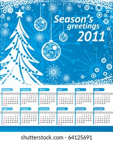 Vector Calendar 2011. Blue background with christmas tree, balls and snowflakes