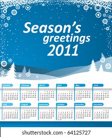Calendario de vectores 2011. Paisaje azul con copos de nieve y texto de saludos de temporada