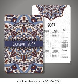 Vector calendar 2017 with decorative elements. Vector mandala design. Template can be used for web and print design.