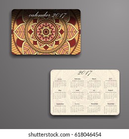 Vector calendar 2017 with decorative elements. Vector mandala design. Template can be used for web and print design.