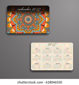 Vector calendar 2017 with decorative elements. Vector mandala design. Template can be used for web and print design.