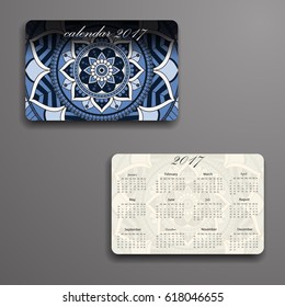 Vector calendar 2017 with decorative elements. Vector mandala design. Template can be used for web and print design.