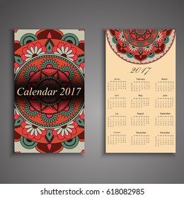 Vector calendar 2017 with decorative elements. Vector mandala design. Template can be used for web and print design.