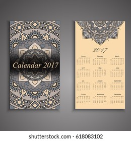 Vector calendar 2017 with decorative elements. Vector mandala design. Template can be used for web and print design.