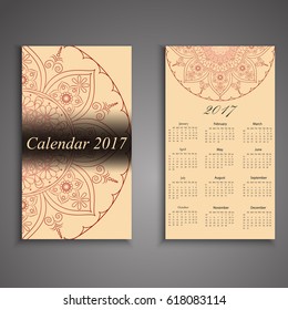 Vector calendar 2017 with decorative elements. Vector mandala design. Template can be used for web and print design.