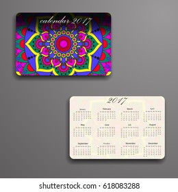 Vector calendar 2017 with decorative elements. Vector mandala design. Template can be used for web and print design.