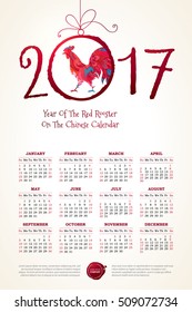 Vector calendar for 2017. Illustration of Red Rooster, symbol of 2017 on the Chinese calendar. Silhouette of cock, decorated with floral patterns. Place for text. Template with week starts Sunday.