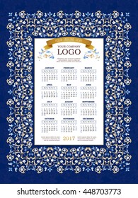 Vector calendar for 2017. Ornate decorated calendar grid. Bright floral decor, place for company logo and tagline, slogan. Template with week starts Monday.