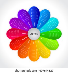 Vector calendar for 2017 year on background of colorful rainbow flower. Week starts on sunday