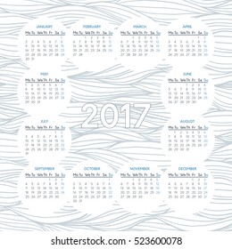Vector calendar for 2017 year on background of wavy lines monochrome pattern. Week starts on monday