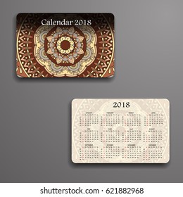 Vector calendar 2018 with decorative elements. Vector mandala design. Template can be used for web and print design.
