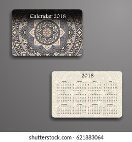 Vector calendar 2018 with decorative elements. Vector mandala design. Template can be used for web and print design.