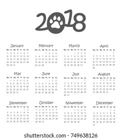 Vector calendar of 2018 new year with simple minimal grid. Week Starts from Monday. Illustration of a dog's footprint in number 2018 — symbol of the year