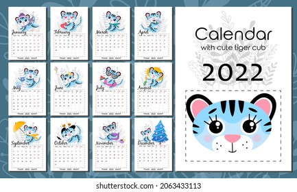 Vector calendar 2022 with symbol of new year. Week starts from Monday. Cute blue tiger cub, in different seasons, doing hobbies. Set of 12 isolated months and cover. A4 format for print