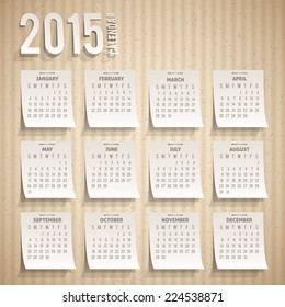 vector calendar grid 2015 year on cardboard texture