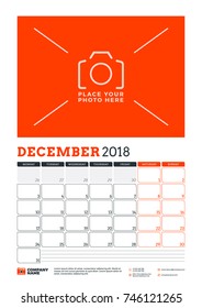 Vector calendar planner template for 2018 year. December. Vector design print template with place for photo. Red and black colors. Week starts on Monday