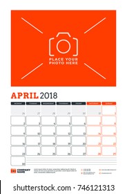 Vector calendar planner template for 2018 year. April. Vector design print template with place for photo. Red and black colors. Week starts on Monday