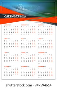 Vector calendar poster A3 size for 2019 Year. Week starts on Monday. Stationery design template with abstract background and place for photo