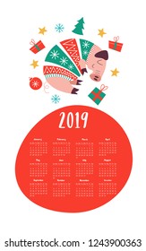 Vector calendar template 2019. Cute pig in a knitted sweater, Christmas decorations and gifts. The pig is the symbol of 2019.