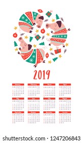 Vector calendar template 2019. Cute pig in a knitted sweater, Christmas decorations and gifts. The pig is the symbol of 2019.