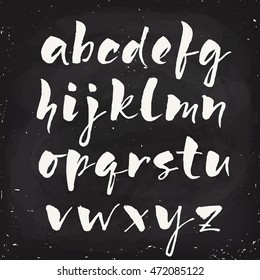 Vector calligraphic alphabet. Chalk alphabet written on blackboard. 