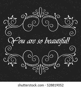 Vector  calligraphic vintage label and logo template on chalkboard. Motivation quote. You are beautiful. 