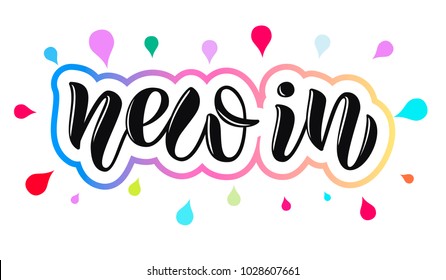 Vector calligraphy text New in on white background with colorful drops  for childish template 