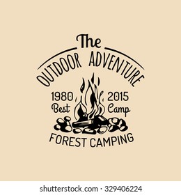 Vector camp logo. Tourism sign with hand drawn bonfire illustration. Retro hipster emblem, badge, label of outdoor adventures.