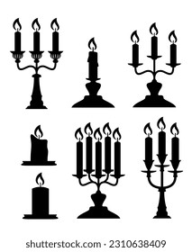 vector candles with holders isolated on white background. burning candles