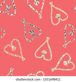 Vector Candy Christmas Straw Heart Ornaments seamless pattern background. Perfect for fabric, scrapbooking and wallpaper projects.