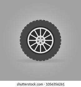 Vector car wheel flat icon or logo element on gray background