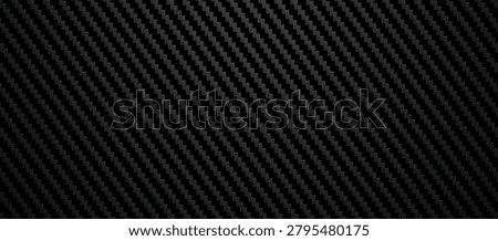 Vector carbon fiber texture. Dark background with lighting.