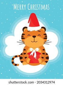 Tarjeta vectorial con tigre lindo en el sombrero y presente en patas sobre fondo claro con copos de nieve. Tarjeta de felicitación, postal, de pago. Eps 10.