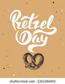 Vector card with hand drawn unique typography design element for greeting cards, decoration, prints and posters. Pretzel day with sketch of baked pretzel. Handwritten funny slogan lettering.
