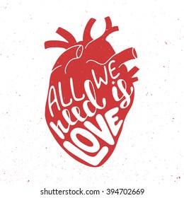 Vector card with hand drawn unique typography design element for greeting cards, prints and posters. All we need is love in red anatomic heart on vintage background