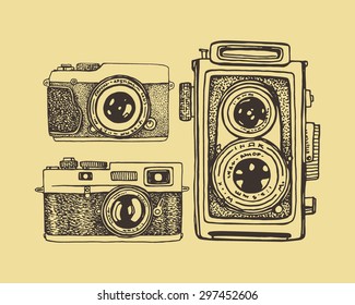 Vector card with hand drawn vintage cameras. Beautiful design elements.