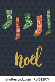 vector card with hanging Christmas socks and Noel hand lettering text