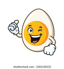 vector cartoon, character, and mascot of a boiled egg with thumbs up hand.