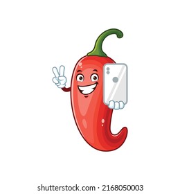vector cartoon, character, and mascot of a chili holding handphone.