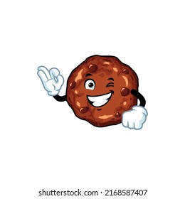 la caricatura vectorial, el personaje y la mascota de una galleta de chocolate dice pose ok.