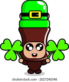 vector cartoon character mascot costume cute chocolate candy roll holding two clover leaves and wearing st patrick's hat