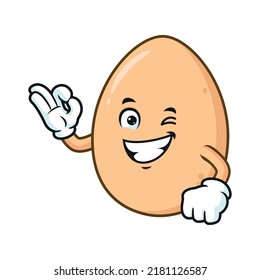 caricatura vectorial, personaje y mascota de un huevo digan pose ok.