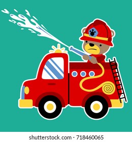 vector cartoon of funny bear on firetruck spraying water